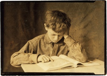 lewis_hine_boy_studying_ca-_1924